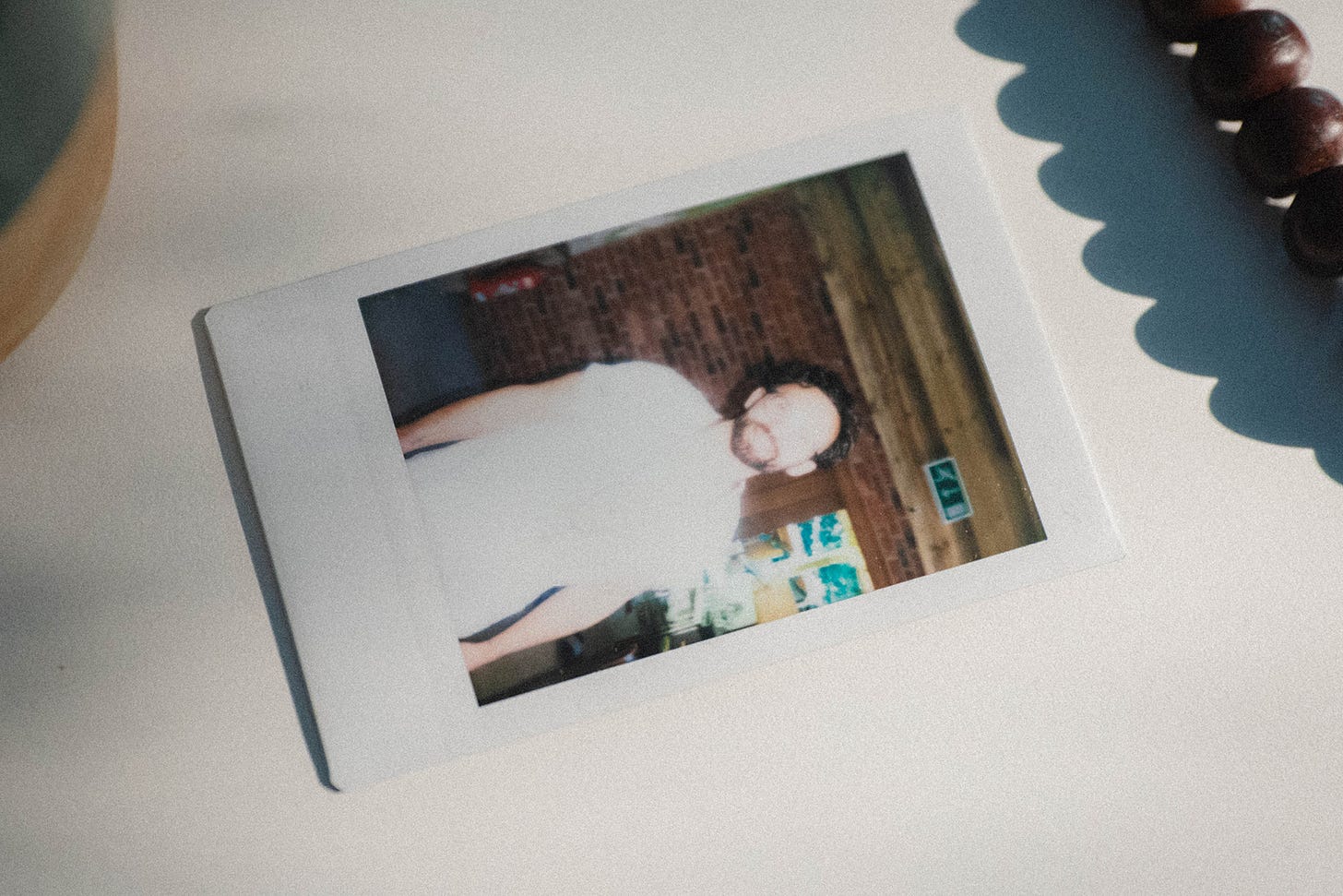 polaroid photo of person smiling