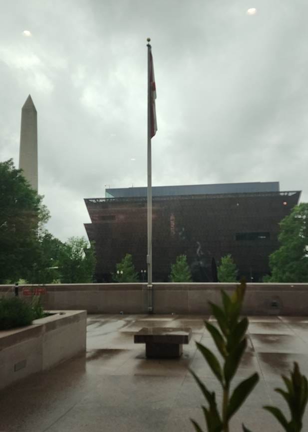 A flag pole with a flag in the background

AI-generated content may be incorrect.