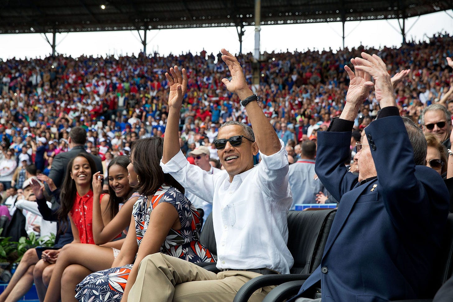 March 22, 2016: At an exhibition baseball game in Havana, Cuba, President Obama and Cuban President Raúl Castro spontaneously join 'the wave,' symbolizing a moment of shared joy and diplomacy. March 22, 2016: At an exhibition baseball game in Havana, Cuba, President Obama and Cuban President Raúl Castro spontaneously join 'the wave,' symbolizing a moment of shared joy and diplomacy.