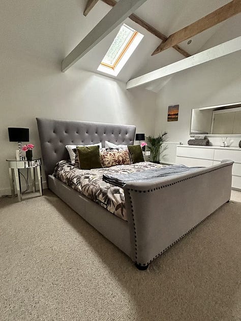 living space and bedroom of The Cowshed plus fully fenced paddock