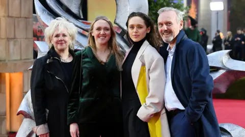 Getty Images Sarah Fisher, Emily Head, Daisy Head and Anthony Head attend the "Dungeons & Dragons: Honour Among Thieves" UK Premiere at Cineworld Leicester Square on March 23, 2023. They are standing together smiling at the camera, all wearing coats. Getty Images Sarah Fisher, Emily Head, Daisy Head and Anthony Head attend the "Dungeons & Dragons: Honour Among Thieves" UK Premiere at Cineworld Leicester Square on March 23, 2023. They are standing together smiling at the camera, all wearing coats.