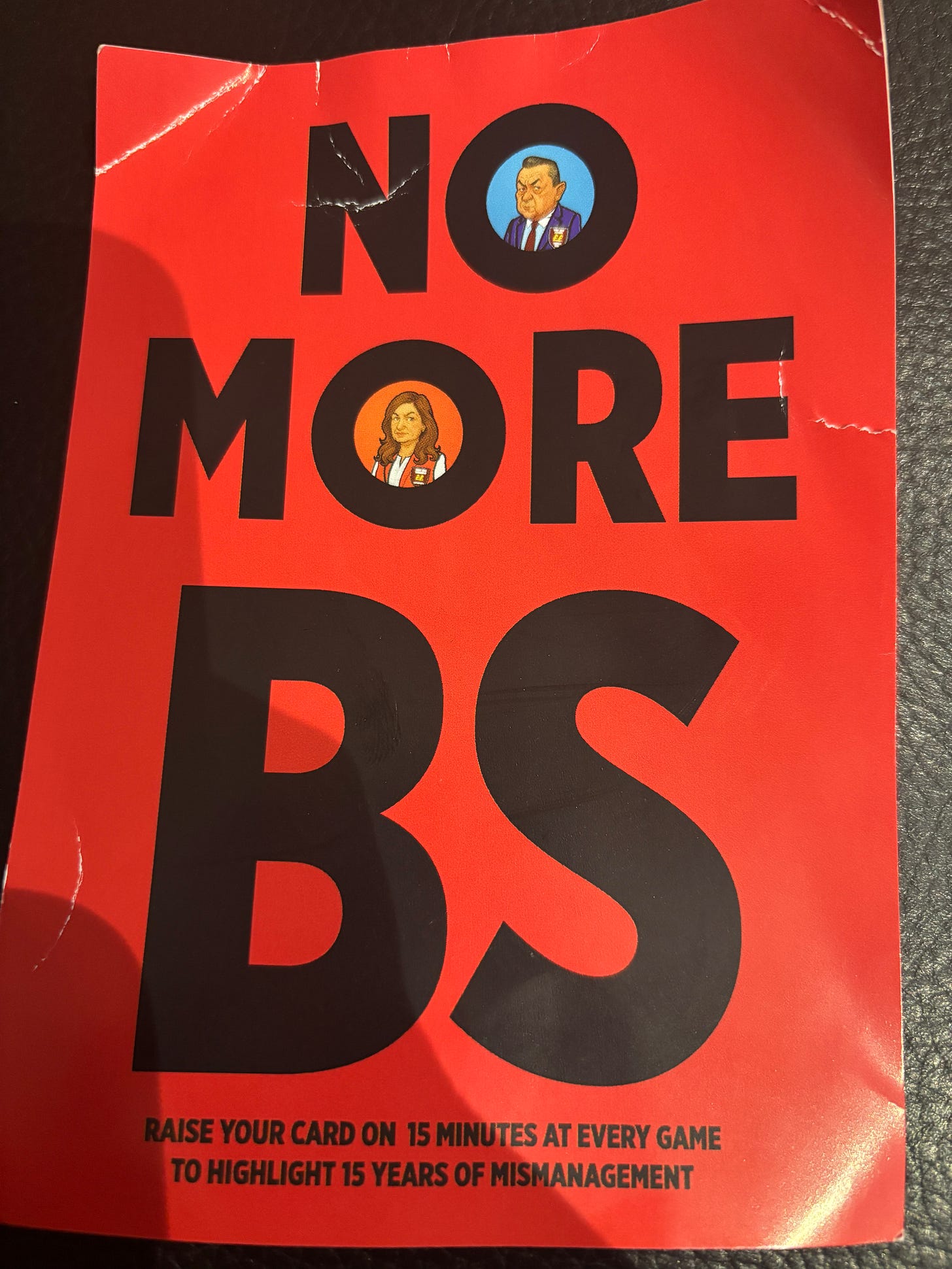 small red card poster with 'No More BS' on