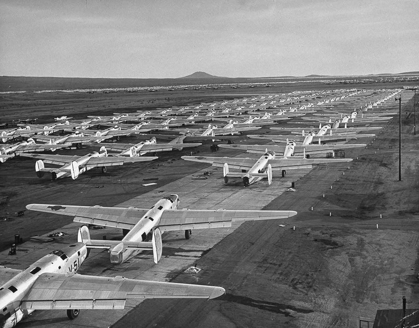 Mighty heavy bombers from WWII await disassembly at Kingman Air Force Base in Arizona, 1947. Mighty heavy bombers from WWII await disassembly at Kingman Air Force Base in Arizona, 1947.