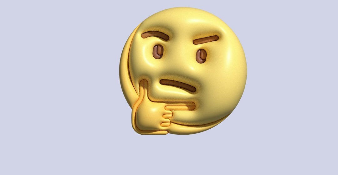 a gold emotiction of a smiley face a gold emotiction of a smiley face