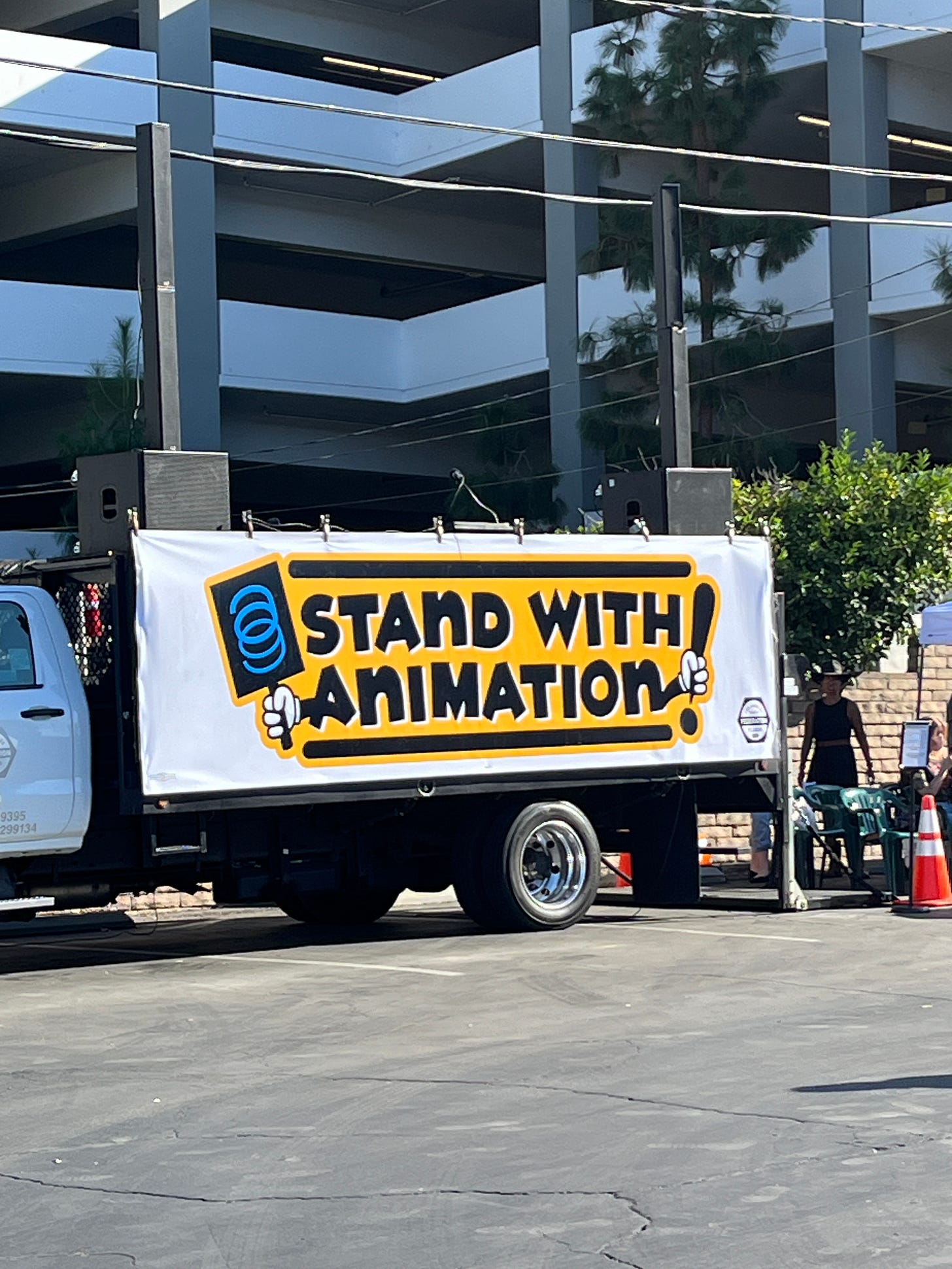 "I stand with animation" banner on a truck. "I stand with animation" banner on a truck.