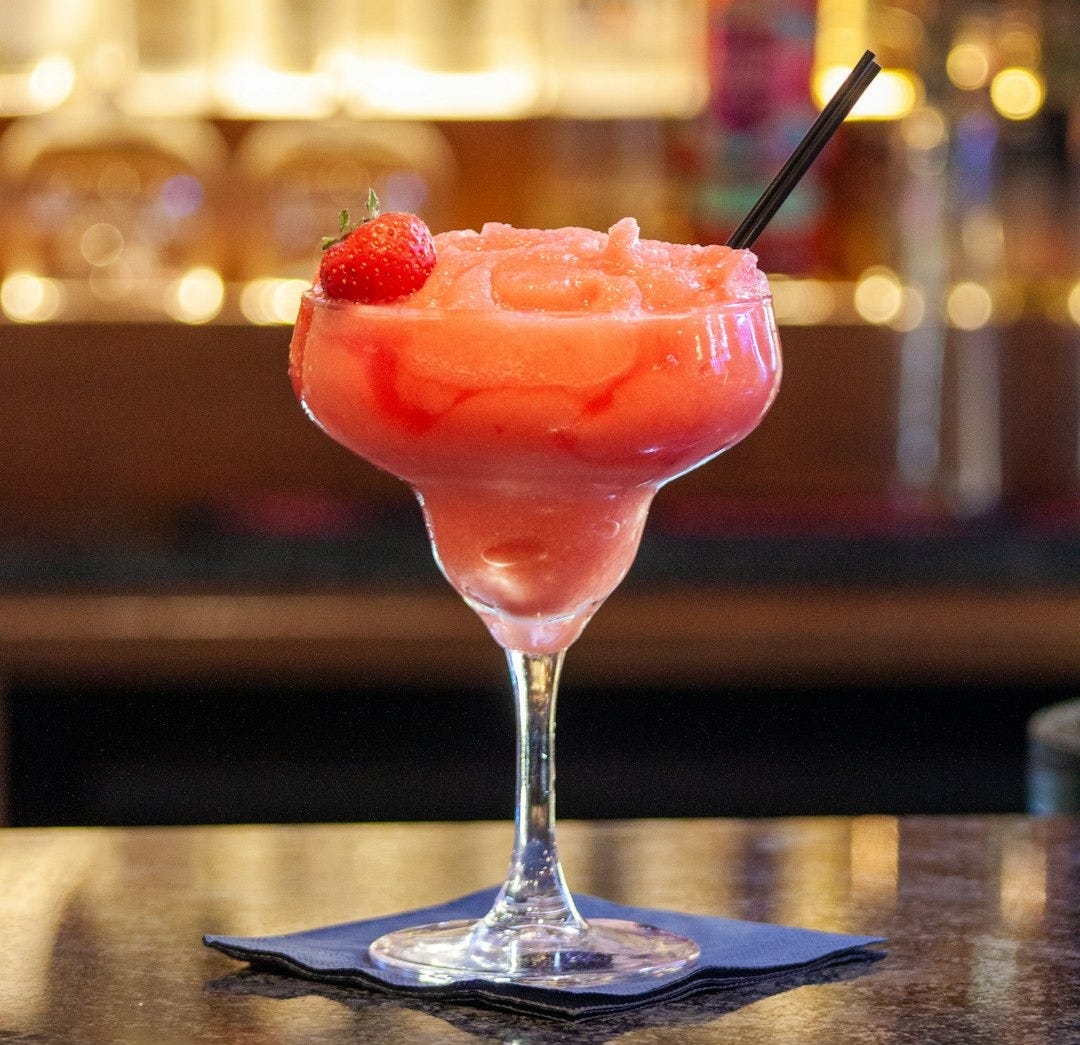 pink ice cream on clear glass