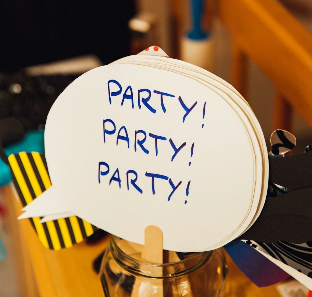 selective focus photography of Party Party Party cards