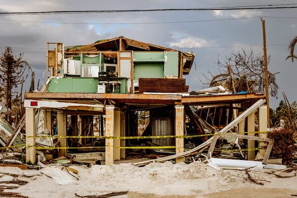 The frame and ruins of a structure hit by a tropical storm. The frame and ruins of a structure hit by a tropical storm.