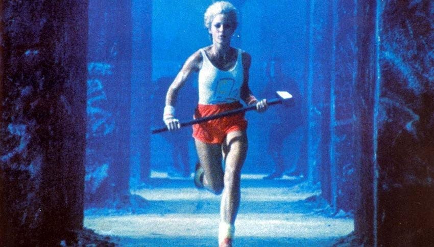 A person running with a hammer

Description automatically generated