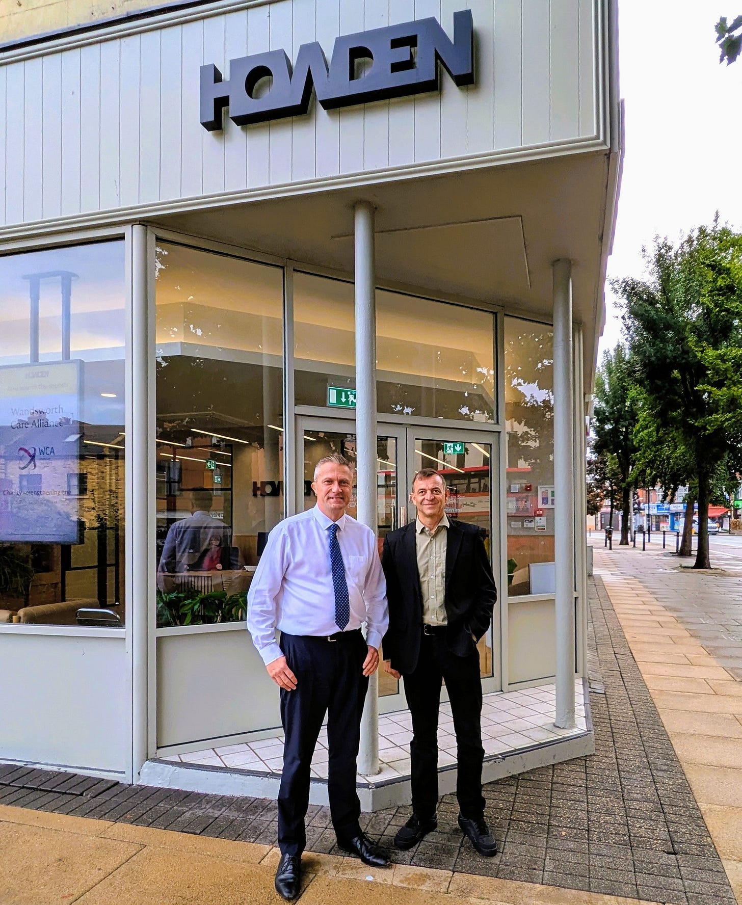 May be an image of 2 people and text