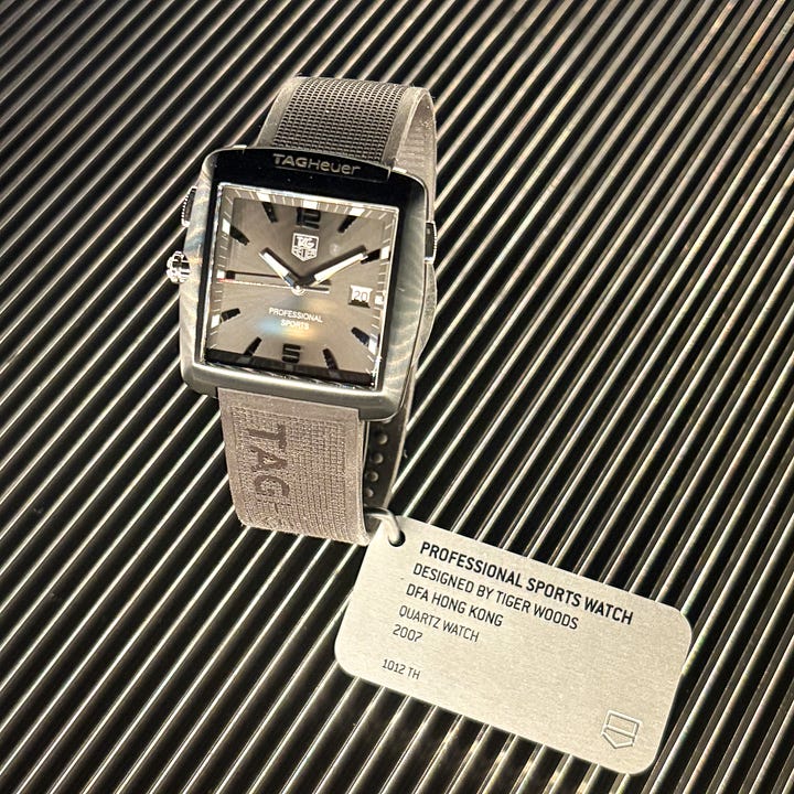 2000s TAG Heuer watches and cell phone tiger woods