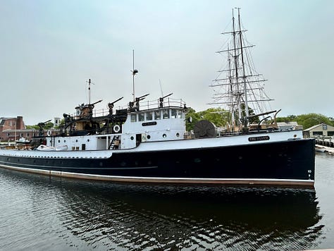 buildings, signs, sky, water
