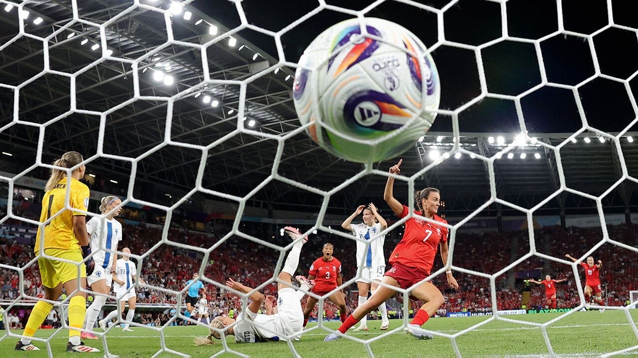 Switzerland celebrate their first goal at the women’s Euros
