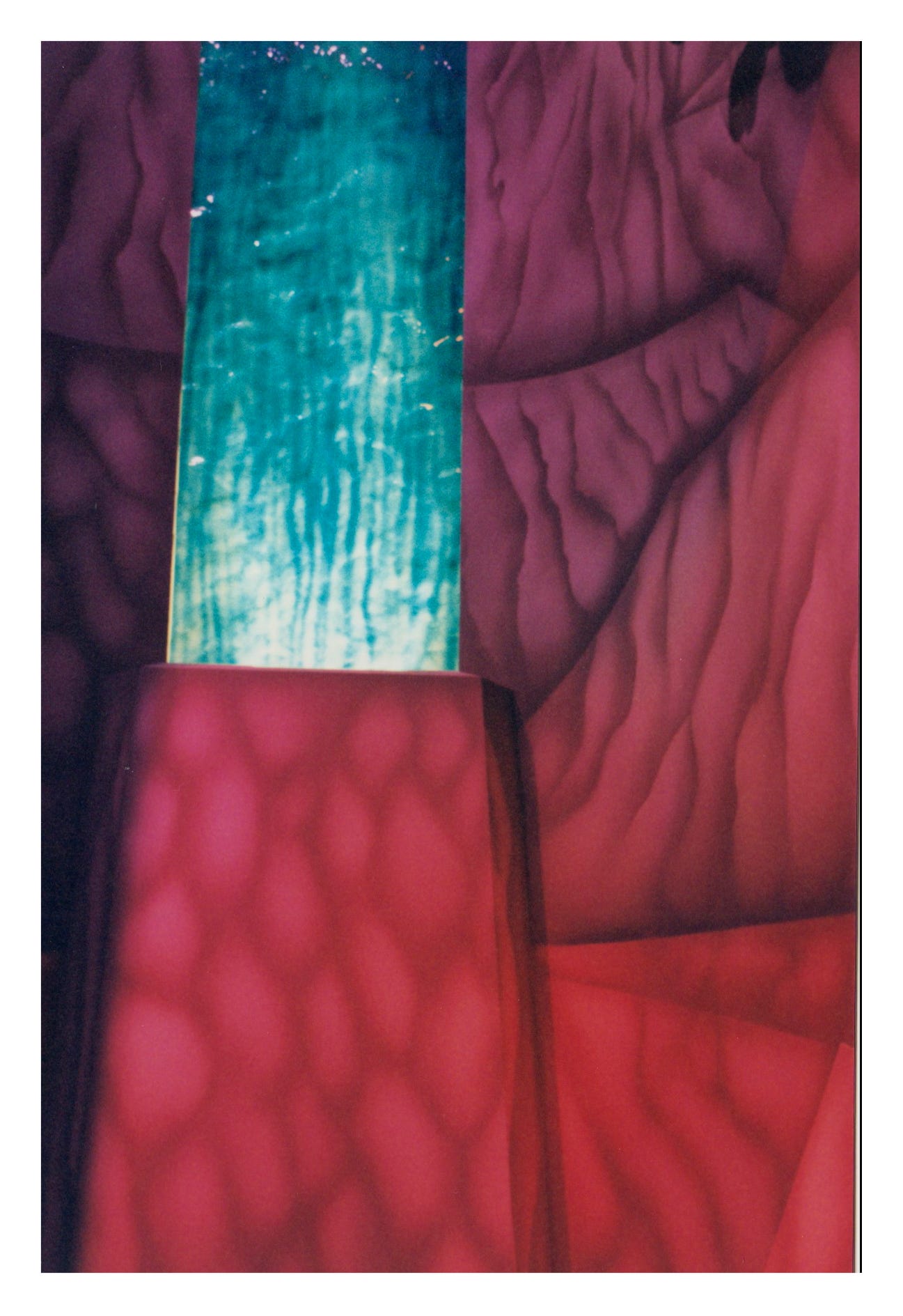 A waterfall inside the Cave set made of a perspex material, backlist, and projected