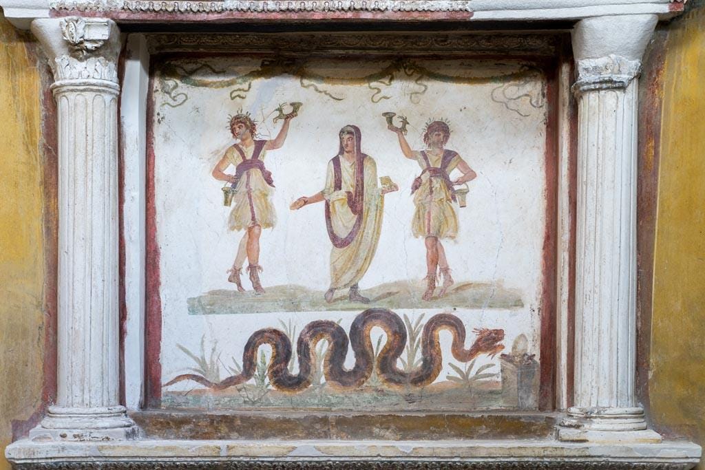 VI.15.1 Pompeii. March 2023. Lararium painting below aedicula. Photo courtesy of Johannes Eber. VI.15.1 Pompeii. March 2023. Lararium painting below aedicula. Photo courtesy of Johannes Eber.