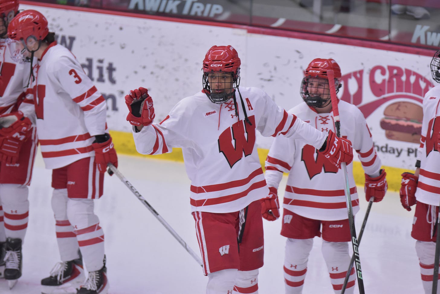 Laila Edwards waves with her right hand as the Wisconsin women's hockey team lines up for pregame lineup announcements inside UW's LaBahn Arena Laila Edwards waves with her right hand as the Wisconsin women's hockey team lines up for pregame lineup announcements inside UW's LaBahn Arena