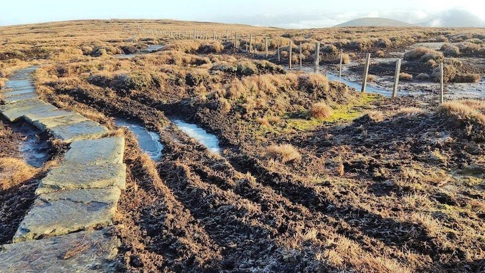 Deep tyre marks at summit of the Cheviot