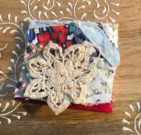 Tiny books and bunting, hand stitched from colorful vintage baby clothes.