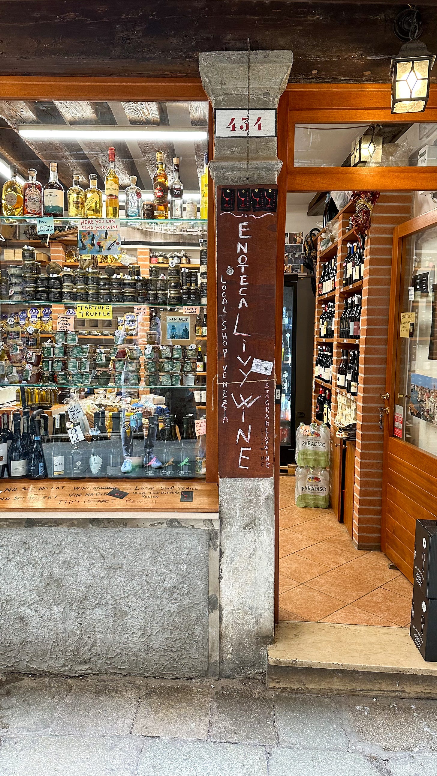 this is a picture of enoteca livy wine shop in the best venice travel guide for italy