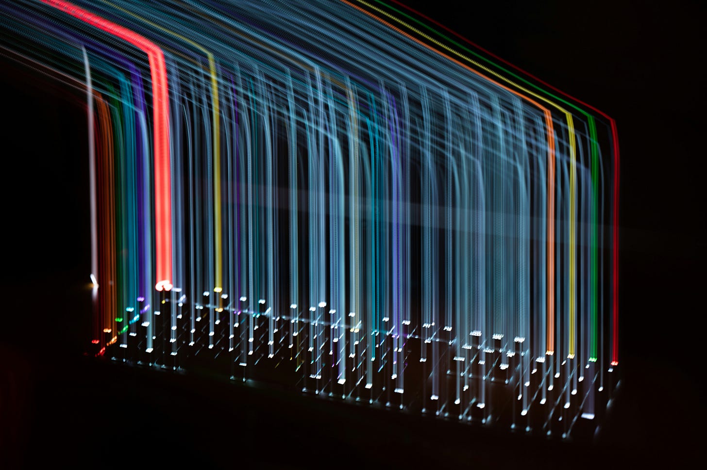 Long-exposure photograph shows a backlighted computer keyboard with streaks of light extending up from the lighted keys. Image credit: Adrien/Unsplash Long-exposure photograph shows a backlighted computer keyboard with streaks of light extending up from the lighted keys. Image credit: Adrien/Unsplash