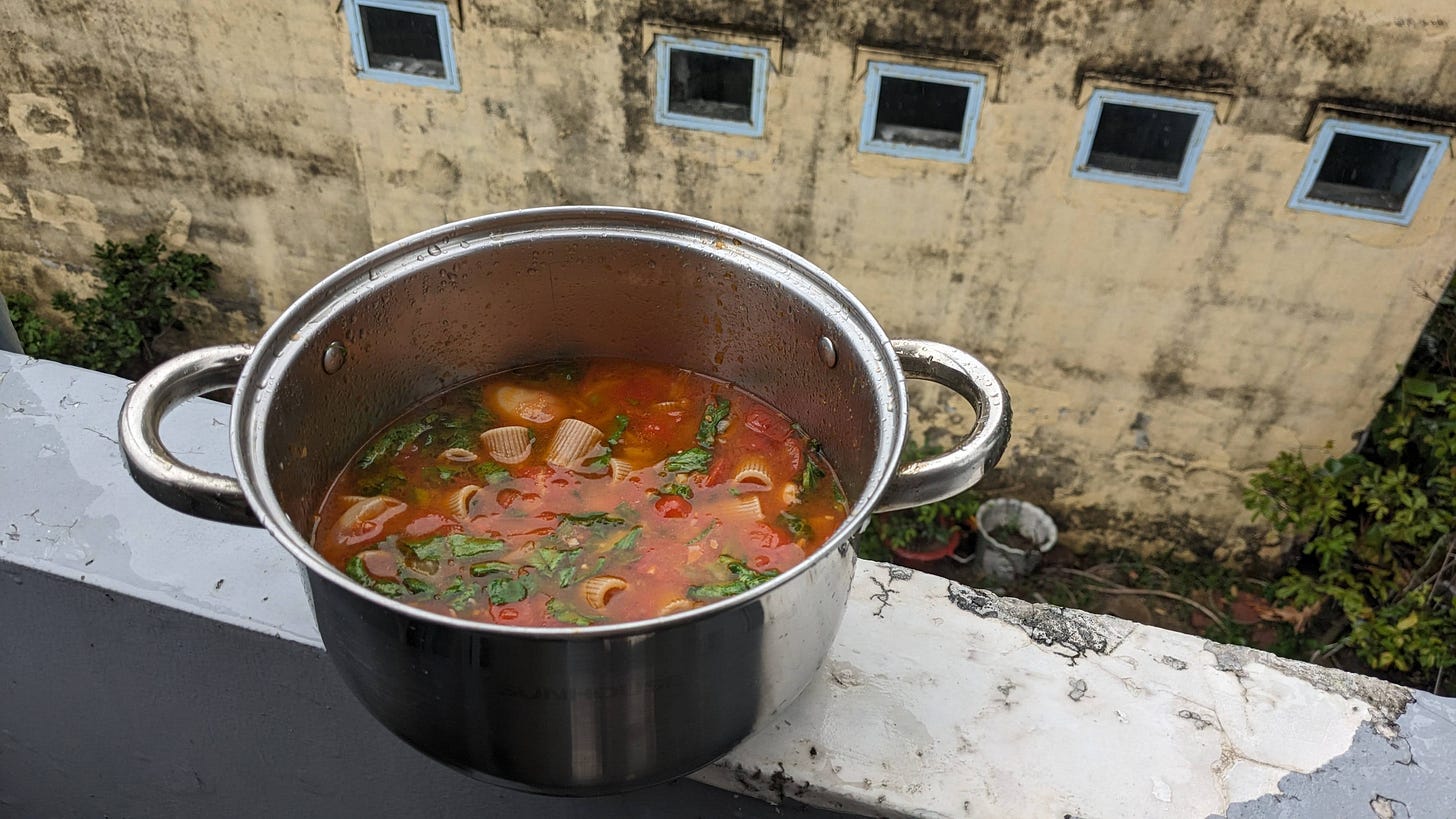 pasta e fagioli in a pot on the balcony