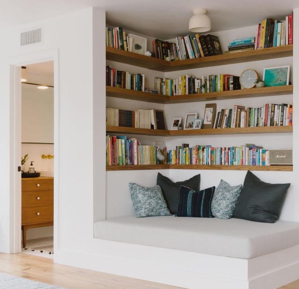 IMage of a built-in reading couch/bookshelves for the corner of a room. IMage of a built-in reading couch/bookshelves for the corner of a room.