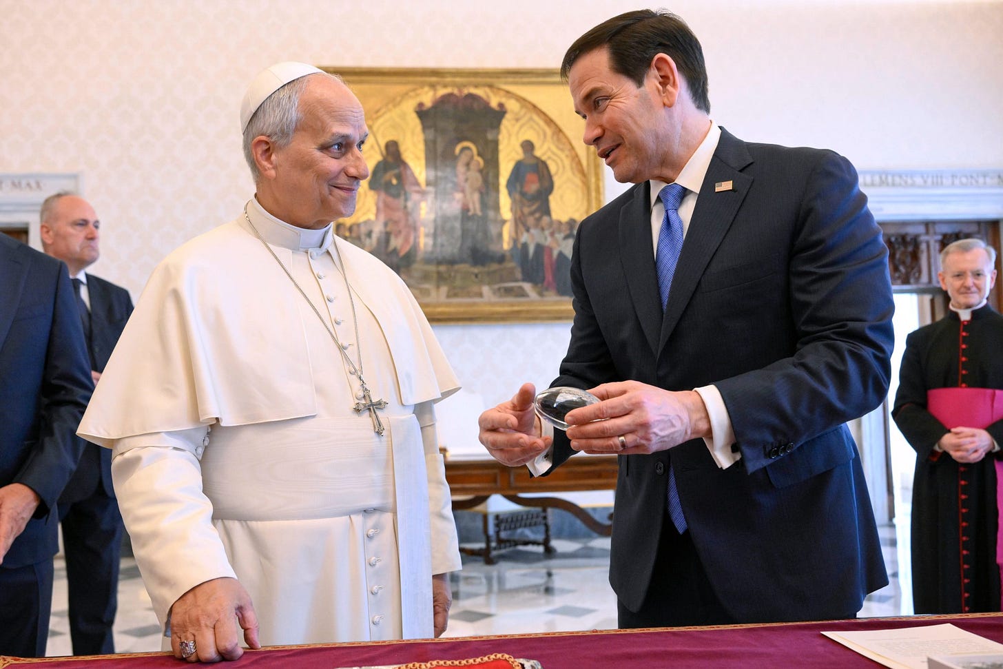 Pope Leo XIV exchanges gifts with U.S. Secretary of State Marco Rubio in the pope’s private library at the Vatican, May 7, 2026. Pope Leo XIV exchanges gifts with U.S. Secretary of State Marco Rubio in the pope’s private library at the Vatican, May 7, 2026.