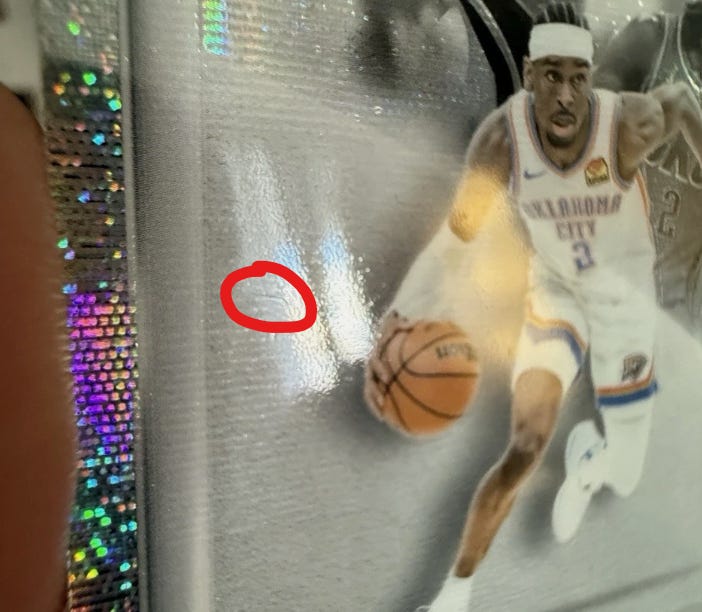 Front surfaces scratches and defects on Topps Chrome Glass Canvas for PSA grading