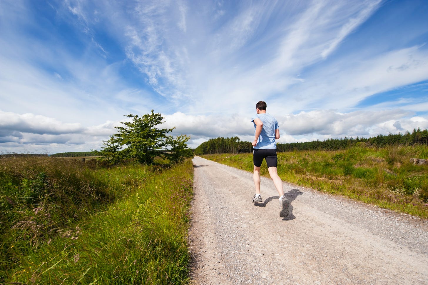 Man running outside in a morning.