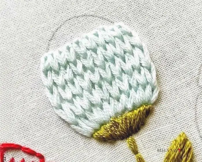 flower pod filled in with the chain stitch