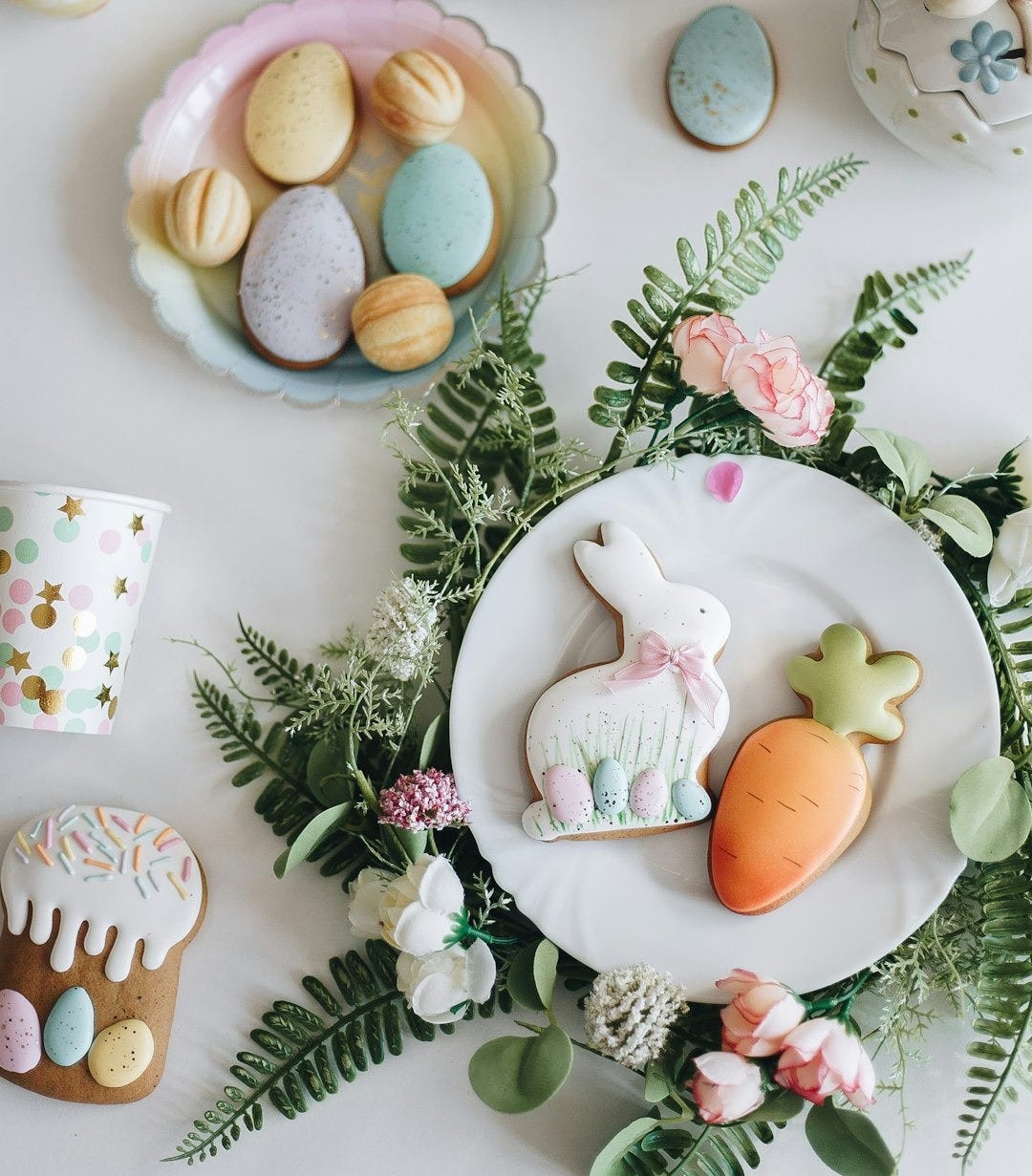 white and pink floral ceramic vase on white table