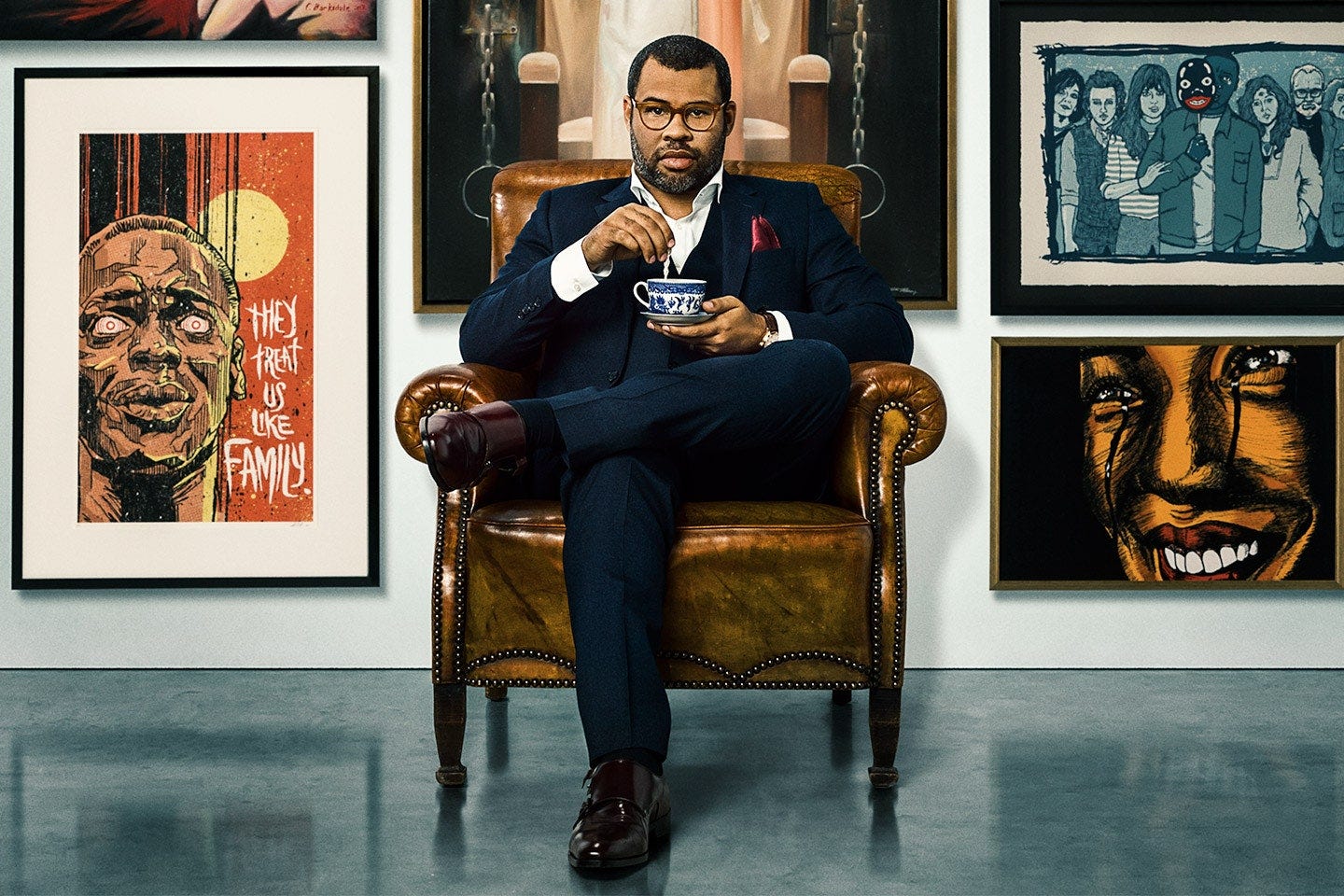 This image may contain Jordan Peele Furniture Sitting Human Person Clothing and Apparel