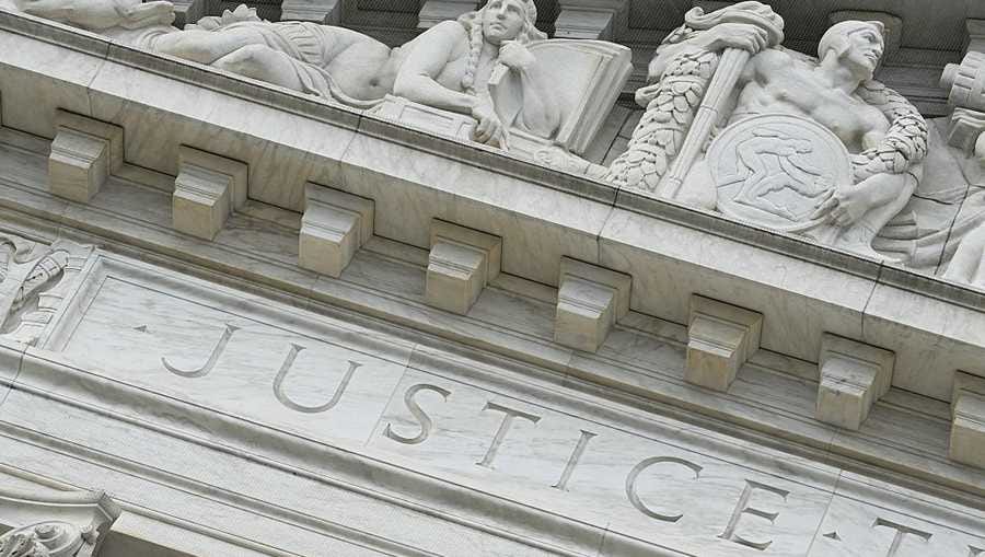 The word "Justice" is seen on the rear side of the US Supreme Court as the Court hears arguments in the case over President Donald Trump's dismissal of Federal Trade Commission (FTC) commissioner Rebecca Slaughter last March in Washington, DC, on December 8, 2025. The case is being closely watched due to its broader implications concerning President Trump's powers to fire the heads of independent government agencies. (Photo by Jim WATSON / AFP via Getty Images) The word "Justice" is seen on the rear side of the US Supreme Court as the Court hears arguments in the case over President Donald Trump's dismissal of Federal Trade Commission (FTC) commissioner Rebecca Slaughter last March in Washington, DC, on December 8, 2025. The case is being closely watched due to its broader implications concerning President Trump's powers to fire the heads of independent government agencies. (Photo by Jim WATSON / AFP via Getty Images)