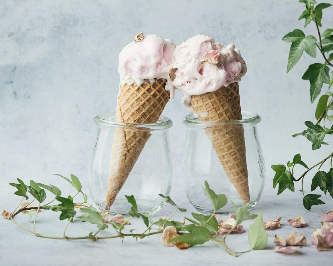 two ice cream on glasses two ice cream on glasses