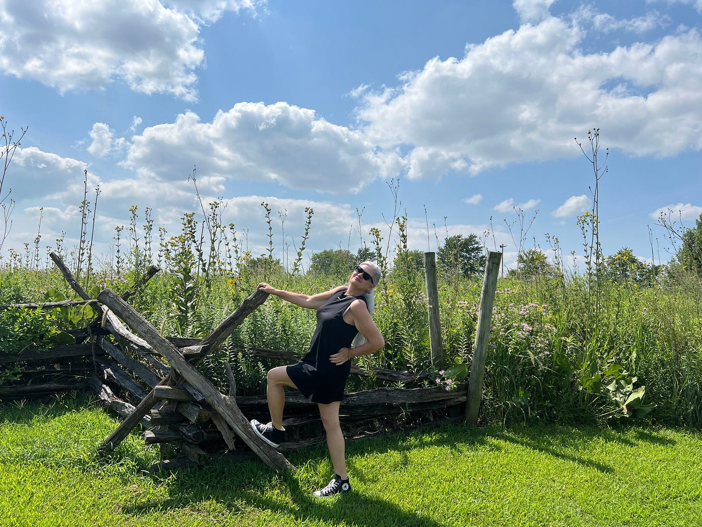 A photo of Michelle Teheux posing at a historical display.