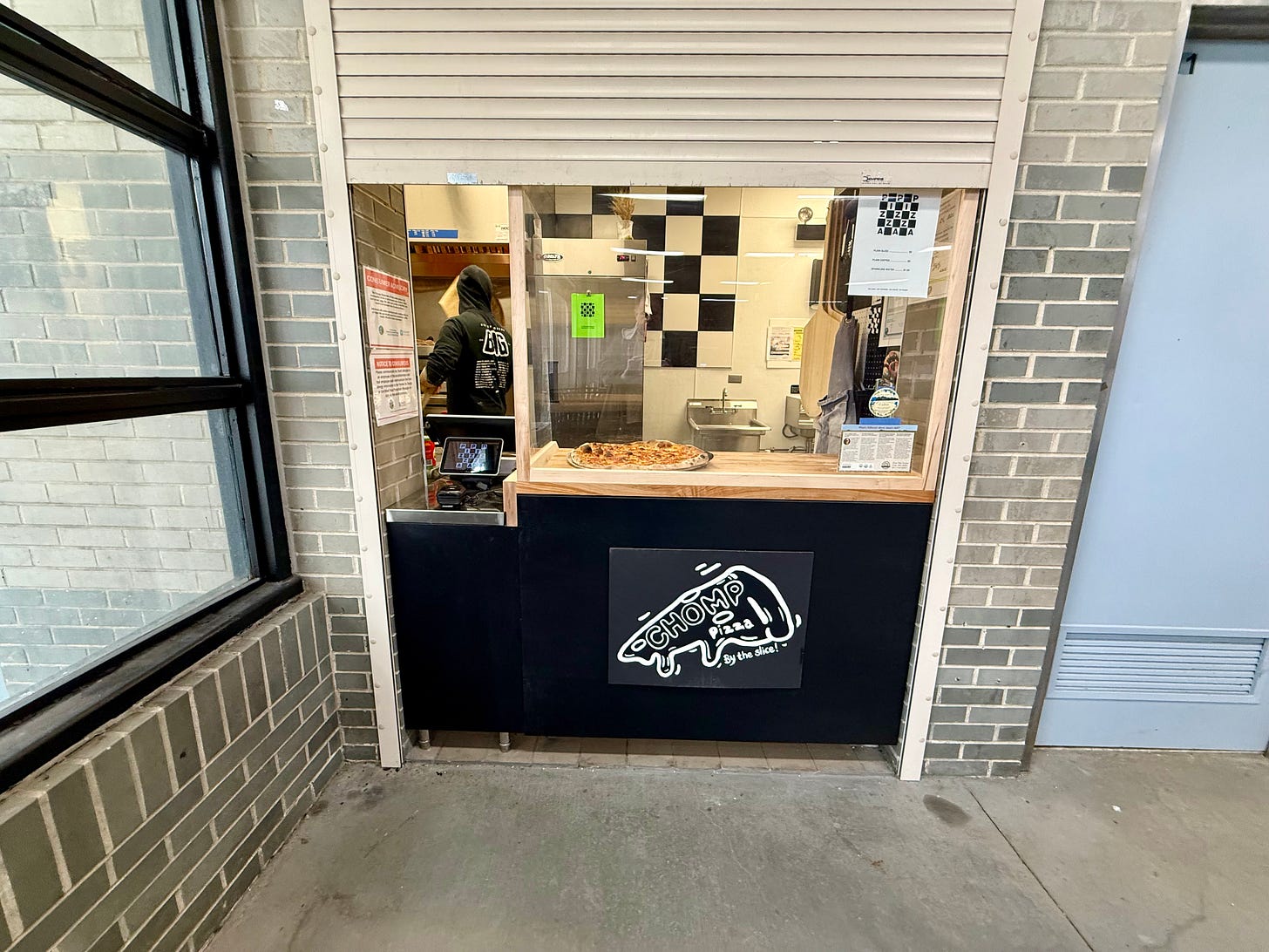 Tiny pizzeria inside a train station