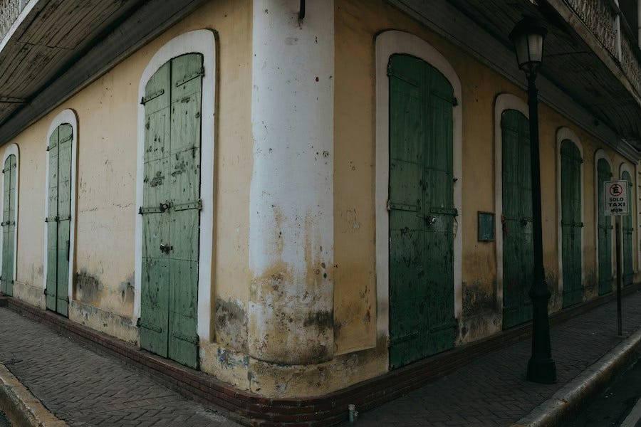 A building with many different doorways. A building with many different doorways.