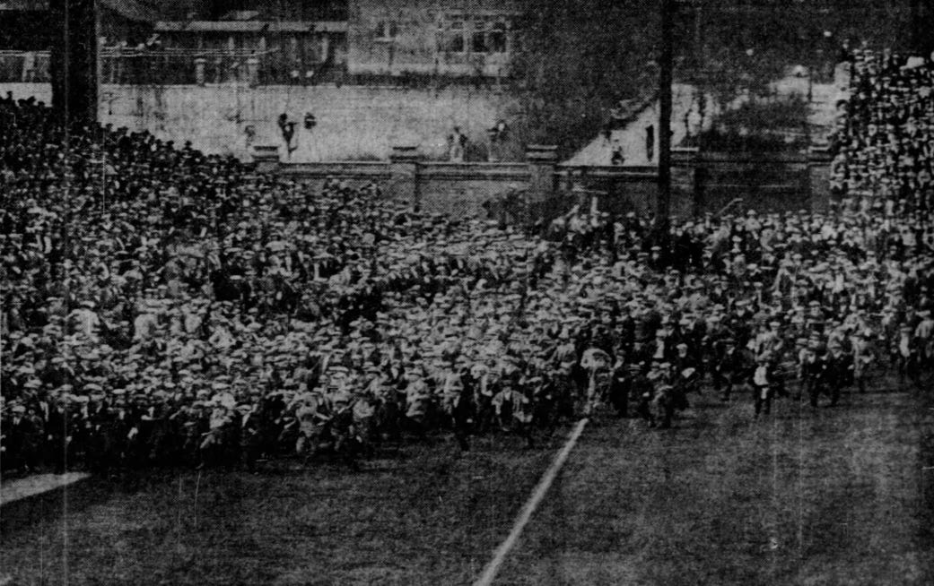 An enormous overflow crowd spilling into left field at Comiskey Park.