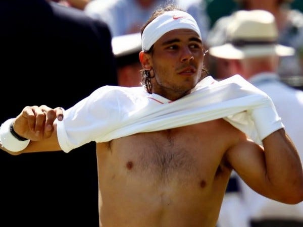 rafael nadal pulling shirt off at buenos aires open 2015 images rafael nadal pulling shirt off at buenos aires open 2015 images