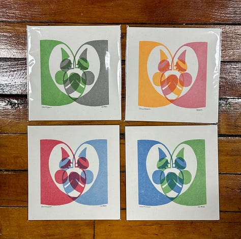 cupid patches, heart earrings, and risograph prints of clown faces