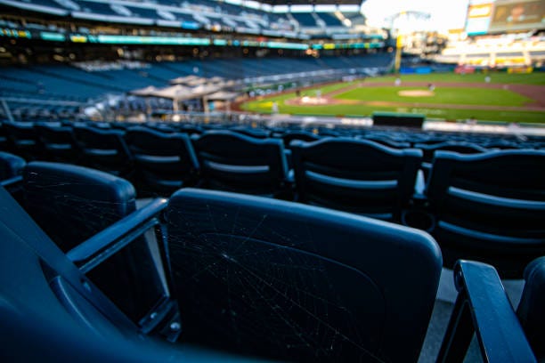 Spider web on an empty seat during the MLB baseball game between the Cleveland Indians and the Pittsburgh Pirates on August 20, 2020 at PNC Park in...