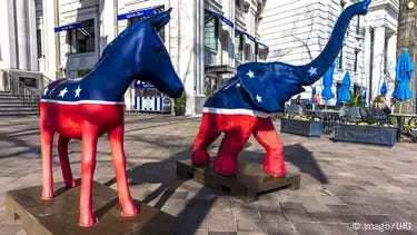 The Republican elephant and the Democratic mule- statues in the colors of the US flag in Washington DC The Republican elephant and the Democratic mule- statues in the colors of the US flag in Washington DC