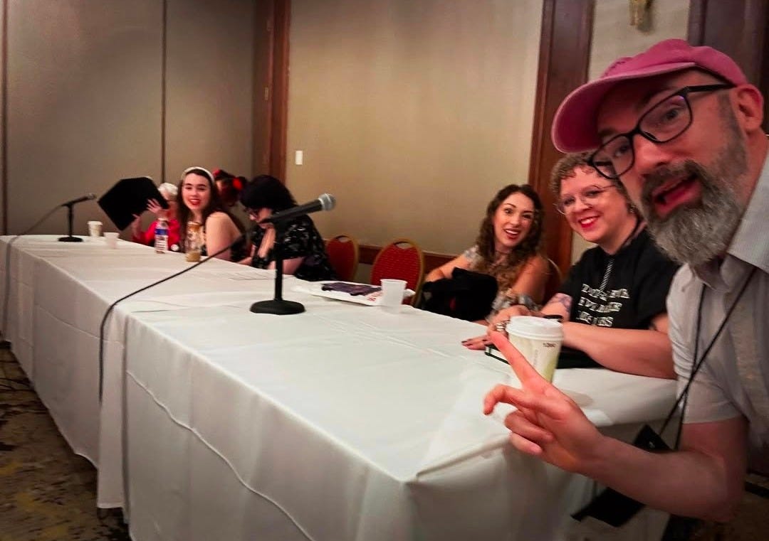 A blurry photo of our horror romance panel at StokerCon, featuring Paula Guran, Sumiko Saulson, Chloe Spencer, Sarah Hans, Rachel Harrison, me, and Clay McLeod Chapman.