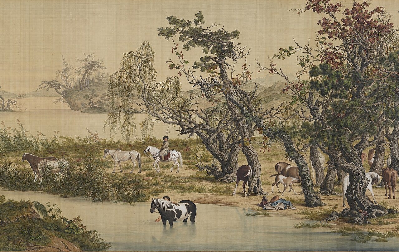 horses grazing in a landscape horses grazing in a landscape