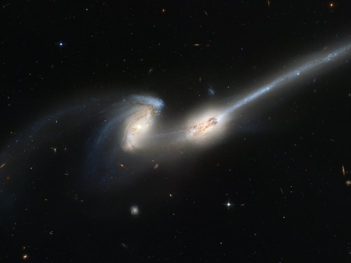 Hubble's newest camera takes a deep look at two merging galaxies