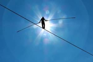 46326026-tightrope-walker-balancing-on-the-rope-concept-of-risk-taking-and-challenge 46326026-tightrope-walker-balancing-on-the-rope-concept-of-risk-taking-and-challenge