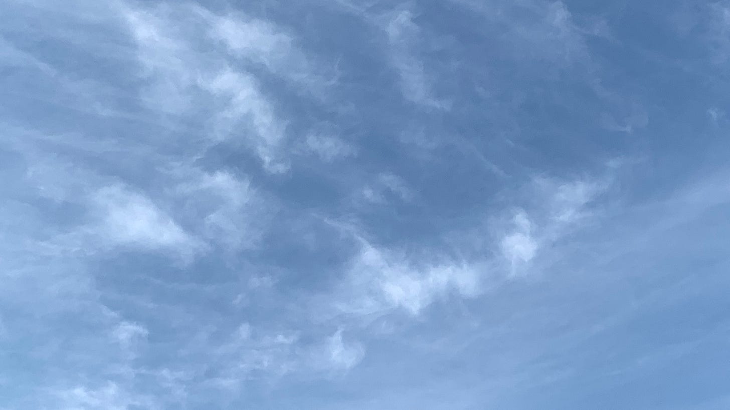 Nice blue sky with schmeary thin cloud-clumps