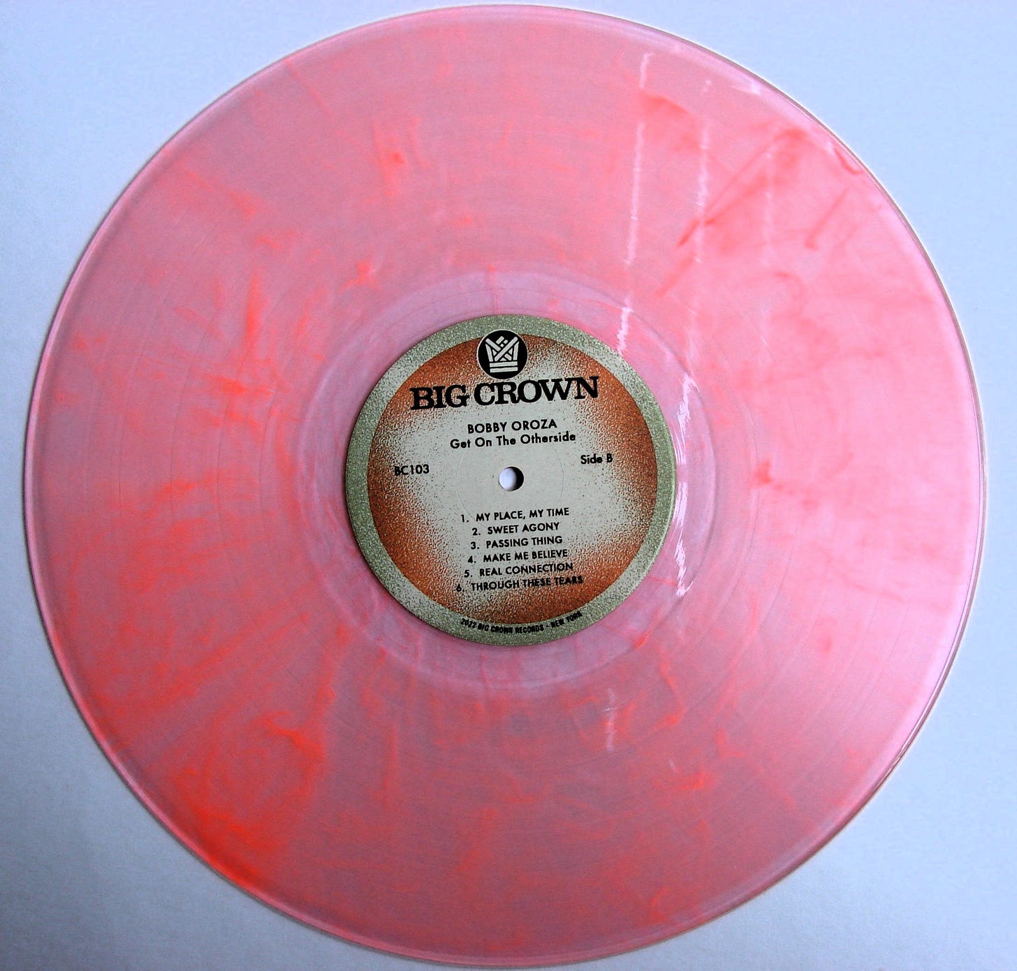 the neon orange vinyl for Get on the Otherside by Bobby Oroza. the neon orange vinyl for Get on the Otherside by Bobby Oroza.