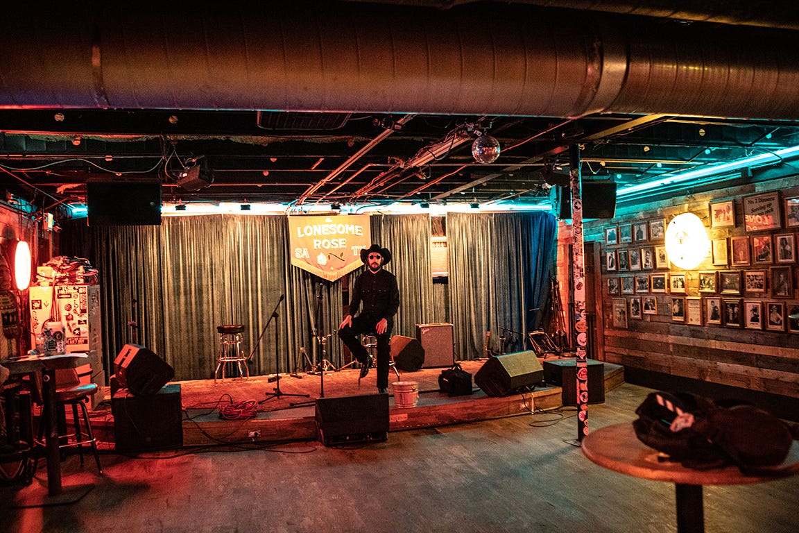 Garrett T. Capps onstage at the Lonesome Dove. Photo by Kirk Weddle