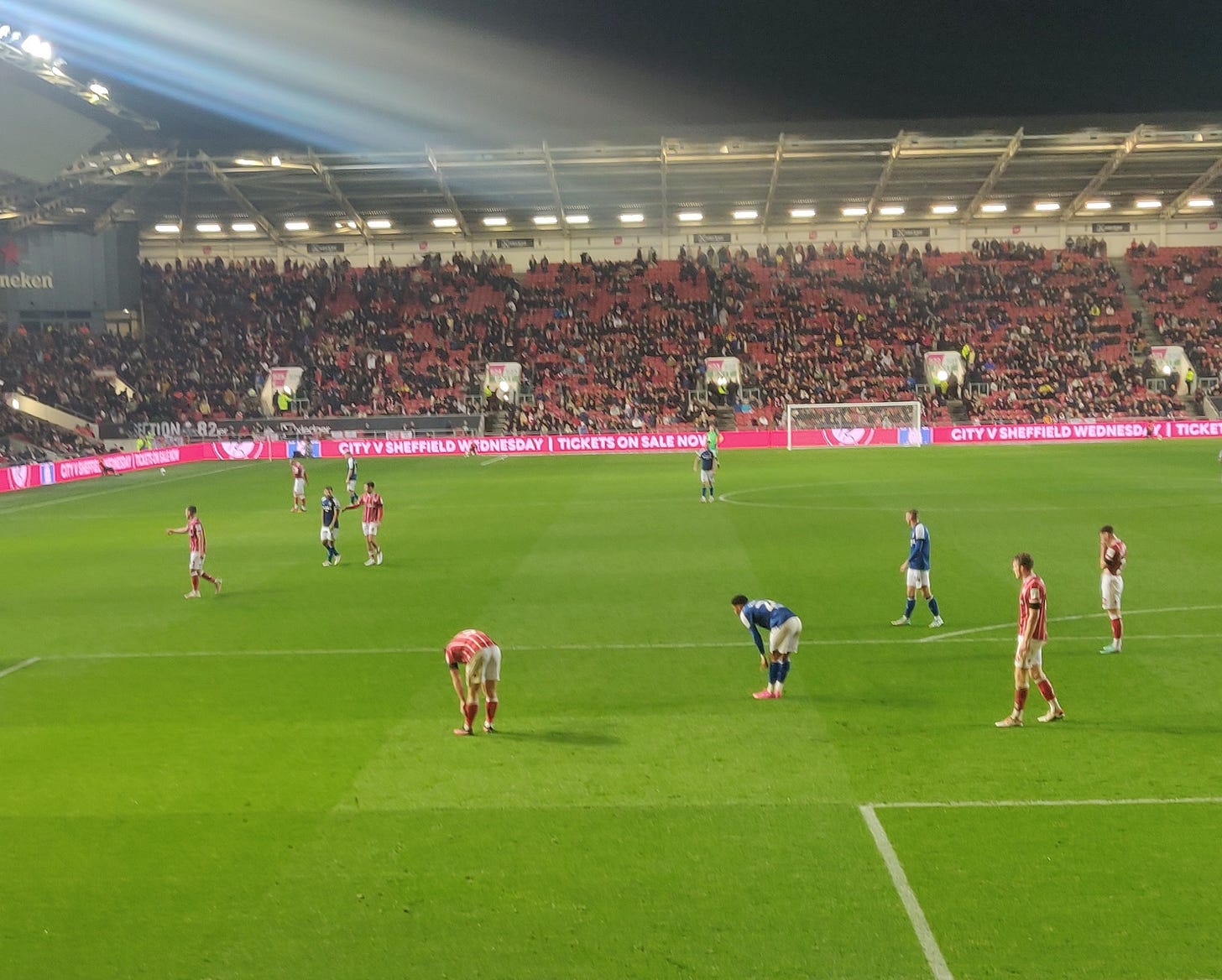 Dane Scarlett pauses to pull up his socks in the Bristol City penalty area last wednesday